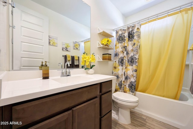 19560 W Valle Vista Way, Litchfield Park, AZ 85340 - full bath with shower / bath combo with shower curtain, wood finished floors, vanity, and toilet