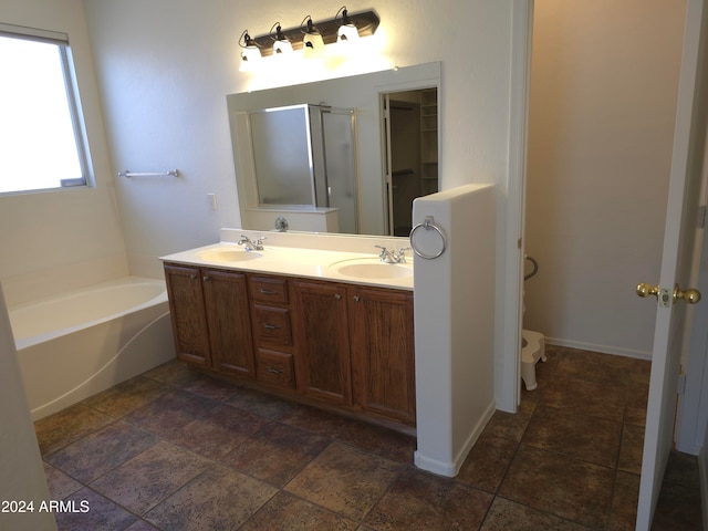 bathroom with vanity and plus walk in shower