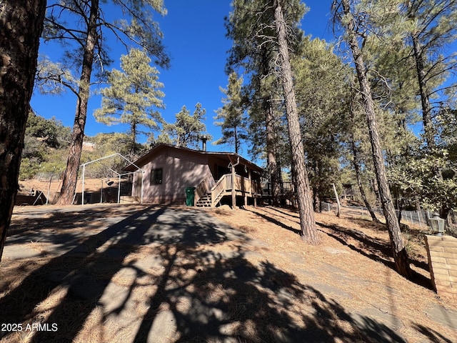 exterior space featuring a wooden deck