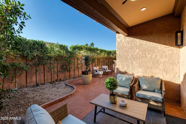 view of patio / terrace with fence and outdoor lounge area
