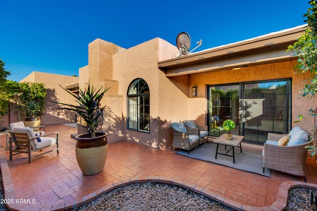 view of patio / terrace with an outdoor living space