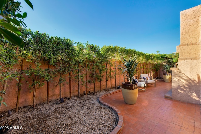 view of patio with a fenced backyard