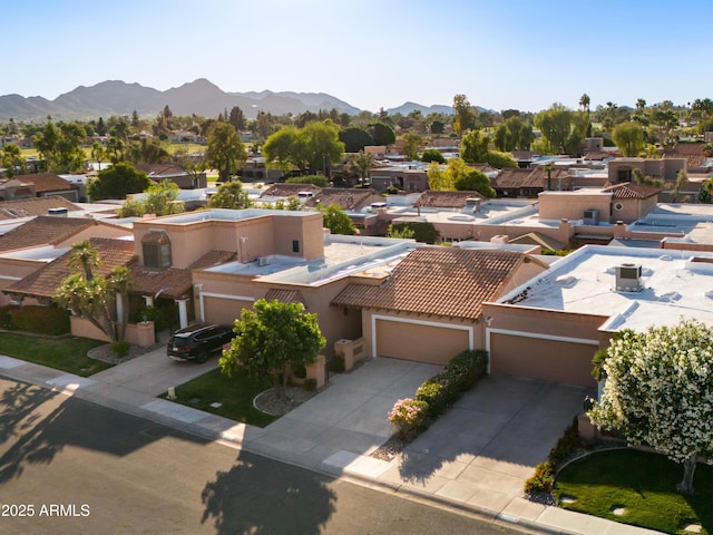 aerial view with a mountain view and a residential view