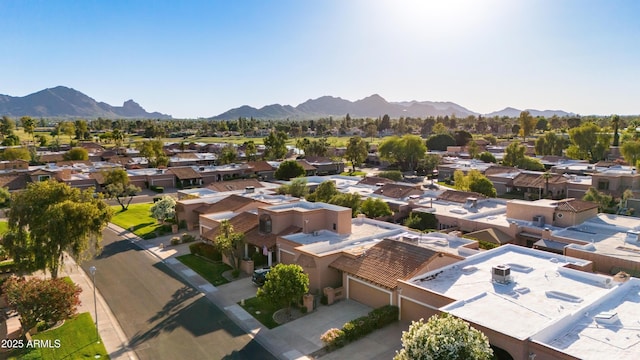 drone / aerial view featuring a mountain view and a residential view