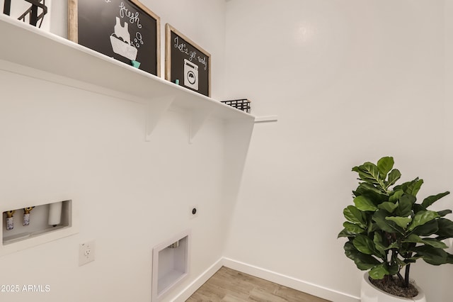 washroom with laundry area, baseboards, wood finished floors, hookup for a washing machine, and hookup for an electric dryer