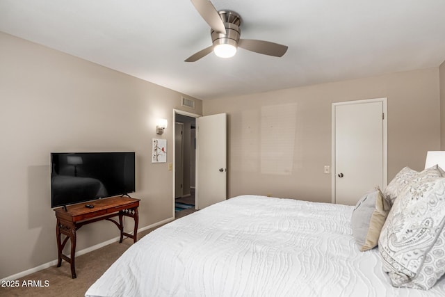 bedroom featuring a ceiling fan, visible vents, carpet, and baseboards