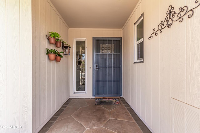 property entrance featuring visible vents