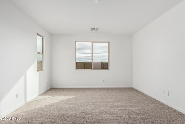 spare room with carpet flooring