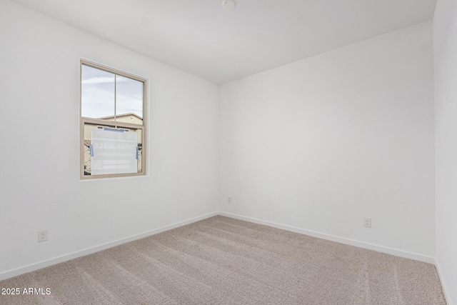 empty room featuring carpet floors