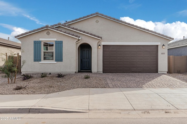 view of front of property featuring a garage