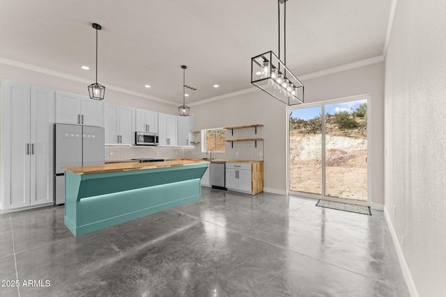 45816 N 288th Ave, Wickenburg, AZ 85390 - kitchen featuring wooden counters, appliances with stainless steel finishes, finished concrete flooring, open shelves, and backsplash