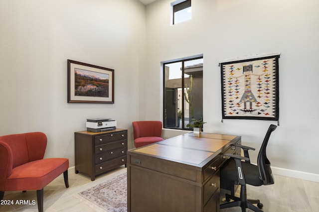 home office with a high ceiling