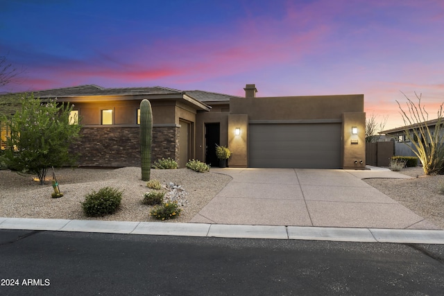 view of front of property with a garage