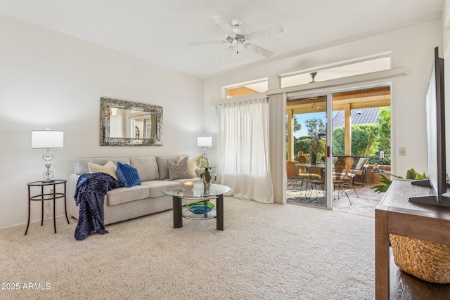 living room with ceiling fan and carpet floors