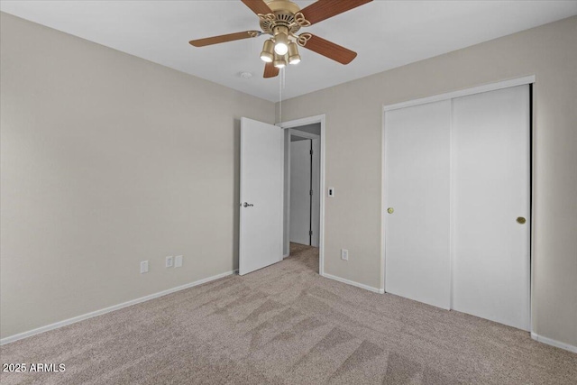 3784 E Washington Ct, Gilbert, AZ 85234 - unfurnished bedroom featuring carpet, a closet, baseboards, and a ceiling fan