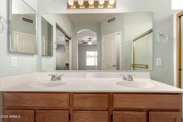 20632 N 103rd Ave, Peoria, AZ 85382 - bathroom featuring double vanity and ceiling fan