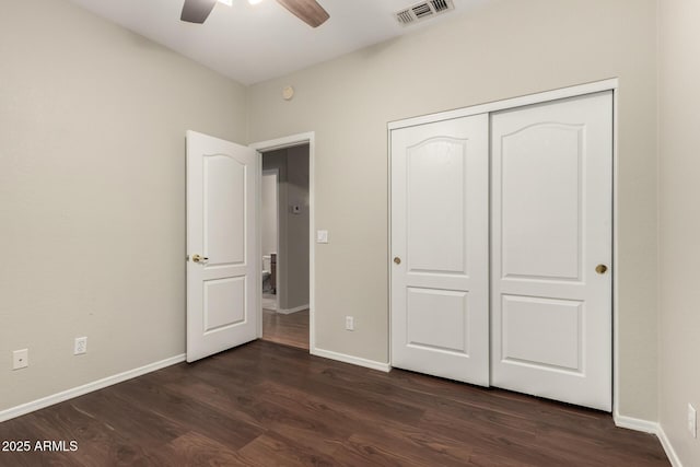 20632 N 103rd Ave, Peoria, AZ 85382 - unfurnished bedroom with dark wood finished floors, a closet, and ceiling fan