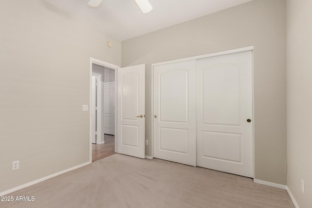 20632 N 103rd Ave, Peoria, AZ 85382 - unfurnished bedroom with light colored carpet, a closet, and ceiling fan