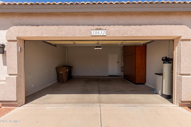 20632 N 103rd Ave, Peoria, AZ 85382 - garage featuring a garage door opener and concrete driveway