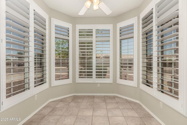 20632 N 103rd Ave, Peoria, AZ 85382 - unfurnished sunroom featuring tile patterned floors and baseboards
