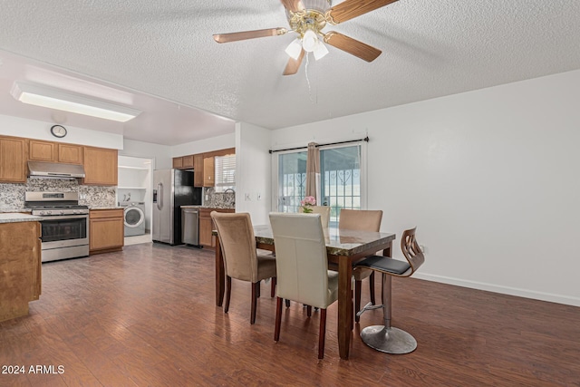 dining space featuring dark hardwood / wood-style floors, ceiling fan, washer / clothes dryer, and a textured ceiling