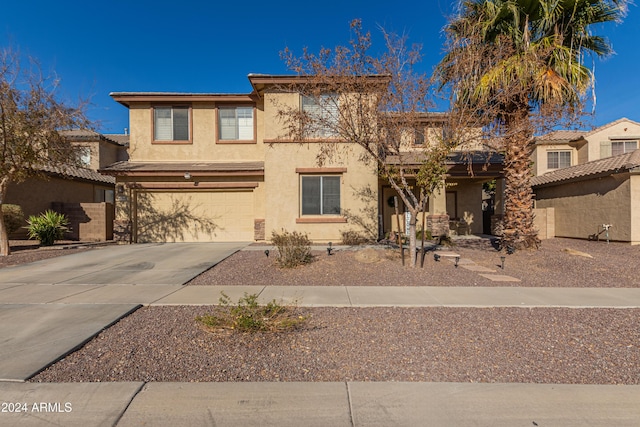 view of front of home with a garage