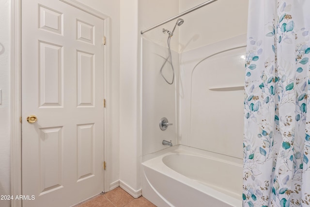 bathroom with shower / tub combo and tile patterned floors