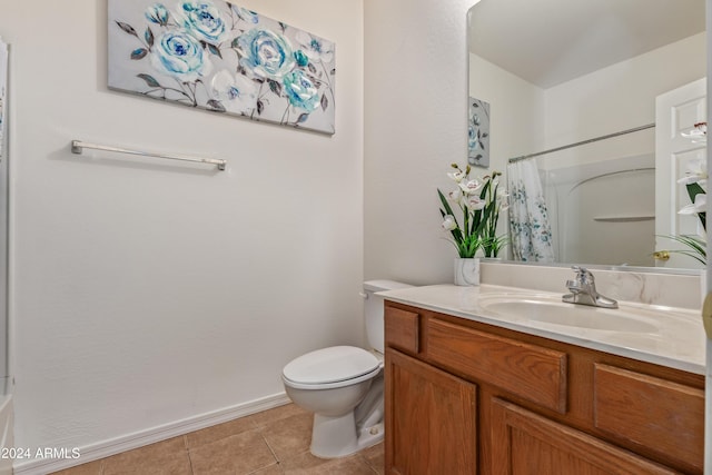 bathroom with tile patterned flooring, vanity, toilet, and a shower with shower curtain