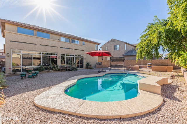 view of pool featuring a patio area