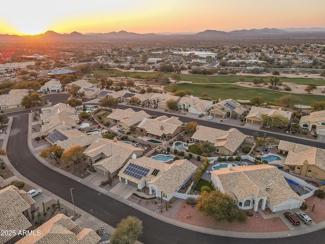 aerial view at dusk with a mountain view