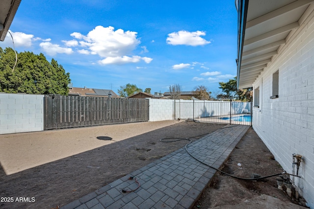 view of patio / terrace featuring a fenced in pool