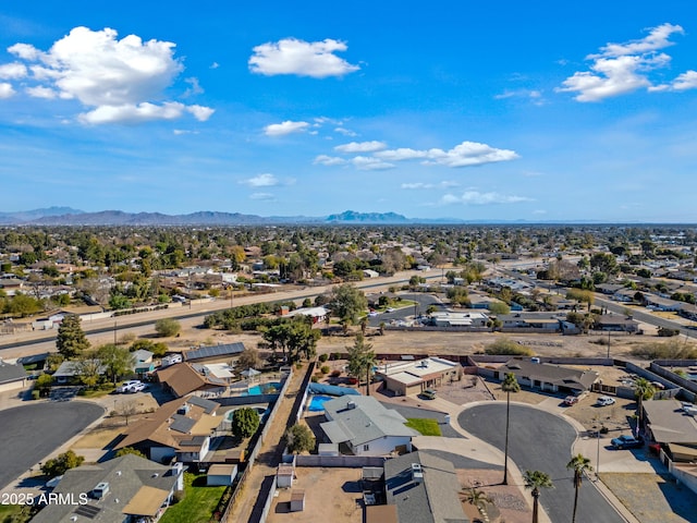 drone / aerial view featuring a mountain view