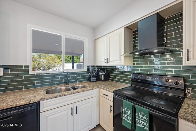 kitchen with white cabinetry, sink, wall chimney exhaust hood, and black appliances