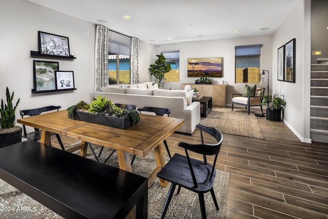 interior space with stairs, recessed lighting, baseboards, and wood tiled floor