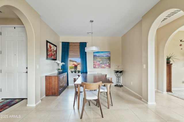 view of tiled dining space