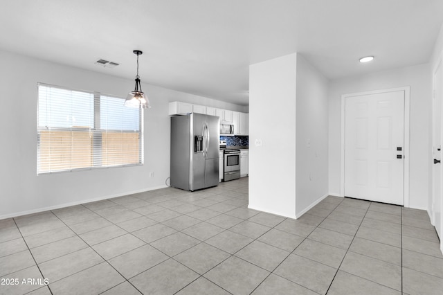 interior space featuring light tile patterned floors