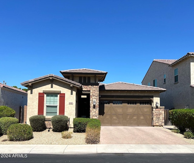 view of front of home with a garage