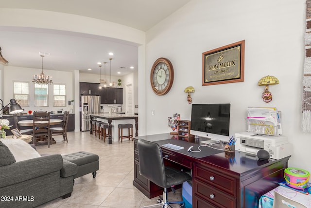 tiled home office featuring a chandelier