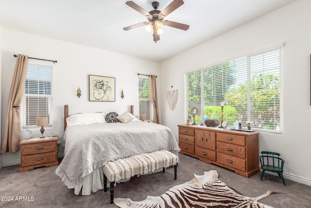 bedroom with light carpet and ceiling fan