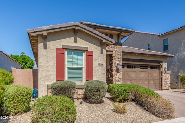 view of front of home with a garage