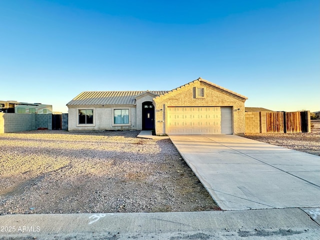 view of front of house with a garage