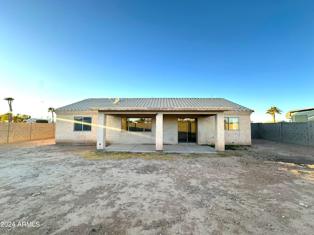 back of house featuring a patio