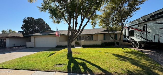 ranch-style house with a front yard and a garage