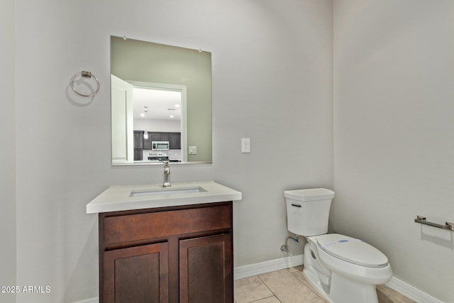 2000 N 36th St Unit 20, Phoenix, AZ 85008 - bathroom with vanity and tile patterned floors