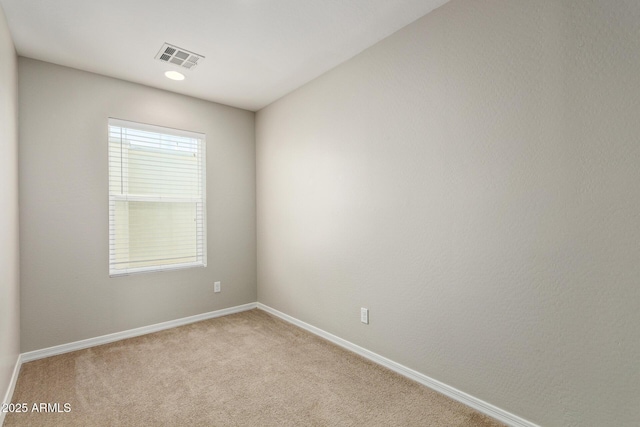 2000 N 36th St Unit 20, Phoenix, AZ 85008 - empty room with baseboards and light colored carpet