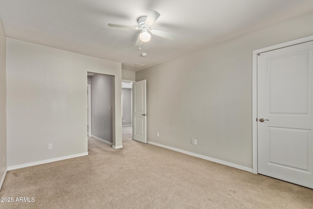 2000 N 36th St Unit 20, Phoenix, AZ 85008 - unfurnished bedroom featuring light carpet and ceiling fan