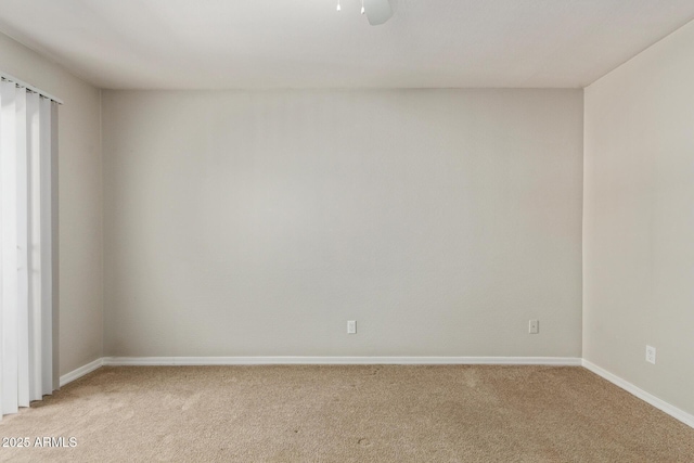 2000 N 36th St Unit 20, Phoenix, AZ 85008 - spare room featuring light colored carpet and baseboards
