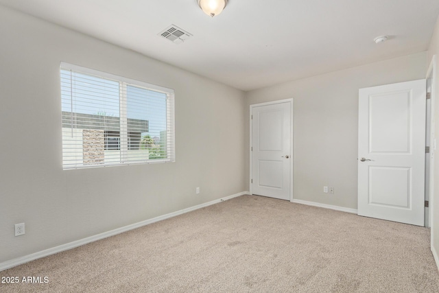 2000 N 36th St Unit 20, Phoenix, AZ 85008 - unfurnished bedroom featuring carpet and baseboards
