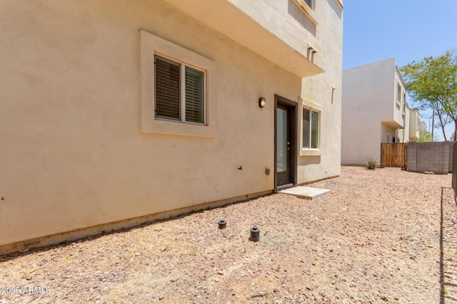 2000 N 36th St Unit 20, Phoenix, AZ 85008 - rear view of house featuring stucco siding