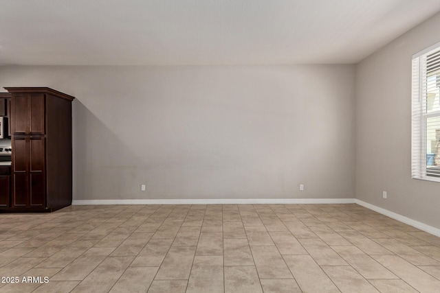 2000 N 36th St Unit 20, Phoenix, AZ 85008 - spare room with light tile patterned floors